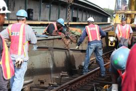 Transit workers on the track